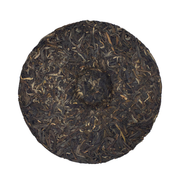 Reverence Raw Puer Cake unwrapped 